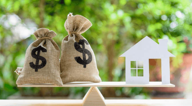 image of scale for flipping houses and money